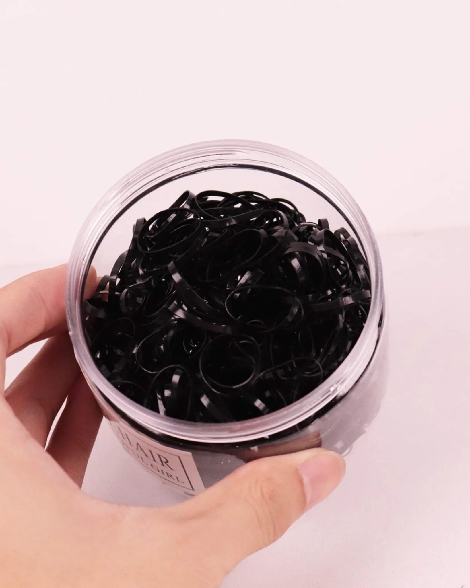 500pcs Black elastics in container