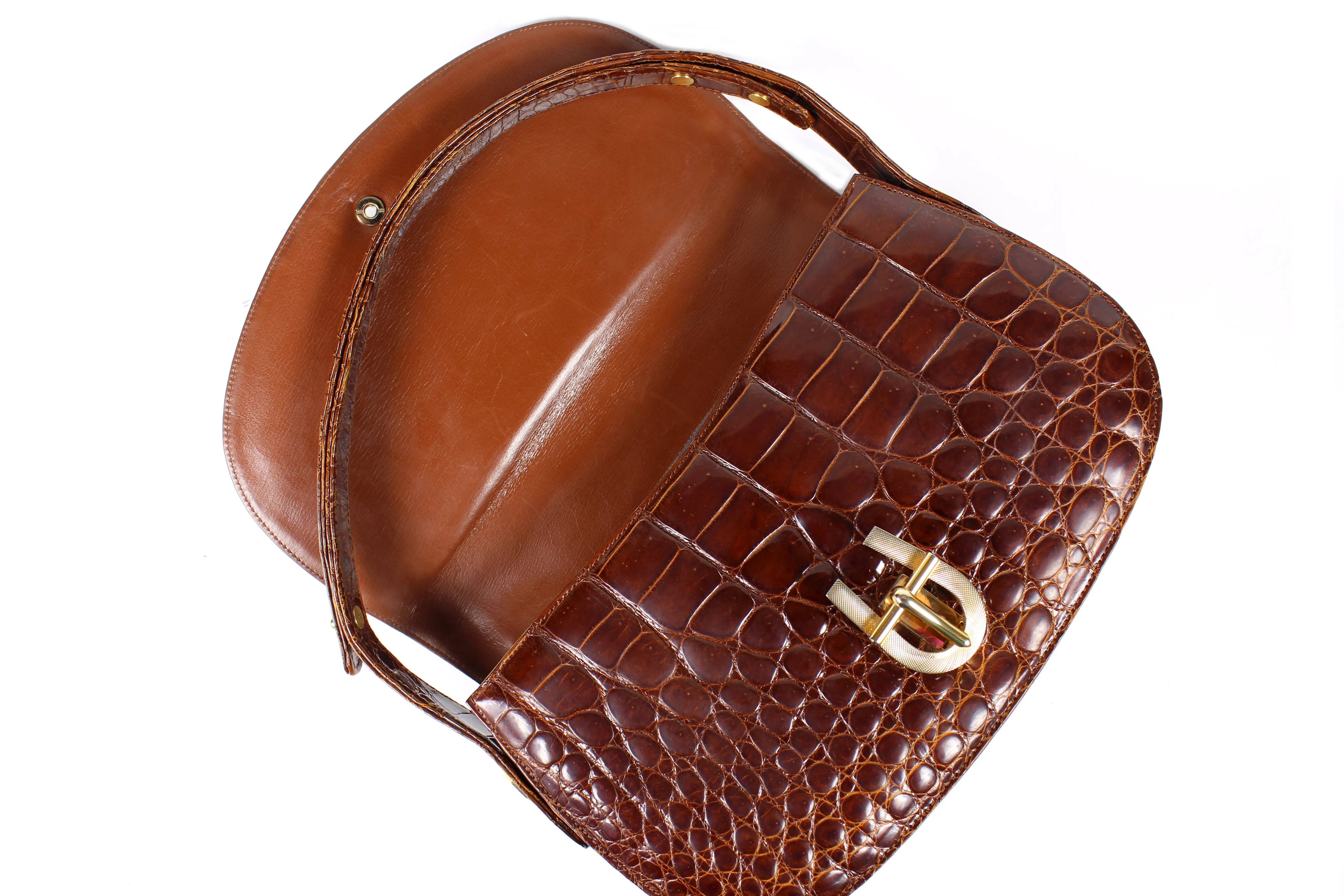 Elongate cognac crocodile skin shoulder bag